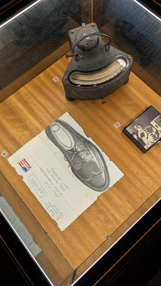 A fot Instrument gauge with an airmail envelope
